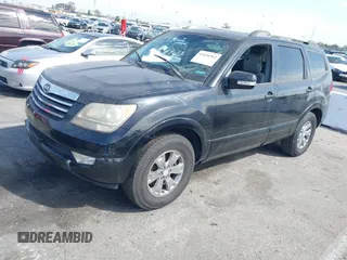 2009 Kia Borrego LX with VIN KNDJJ741095039023, listed as a IAAI auction lot 41696562 with 239,921 mi miles. Bid and sale history available at carsss.com. Image 2.