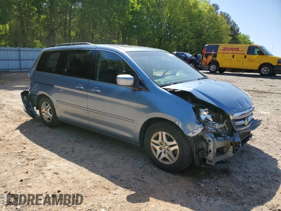 2005 Honda Odyssey EX-L z VIN 5FNRL386X5B034514, wystawiony jako Copart lot #52702435 z przebiegiem 65 988 mil mil oraz Szkoda całkowita • Salvage title. Historia ofert i sprzedaży dostępna na DreamBid. Obrazek 4.
