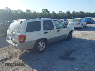 2002 Jeep Grand Cherokee Laredo with VIN 1J4GX48S62C310060, listed as a IAAI auction lot 42546172 with Not provided miles and . Bid and sale history available at DreamBid. Image 4.