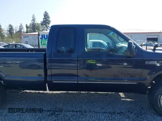 2000 Ford Super Duty F-250 XL with VIN 1FTNX21S5YEC82650, listed as a IAAI auction lot 42105861 with 155,878 mi miles. Bid and sale history available at carsss.com. Image 13.