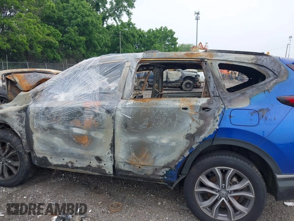 2021 Honda CR-V Touring with VIN 7FARW2H98ME008086, listed as a IAAI auction lot 42411519 with Not provided miles and . Bid and sale history available at DreamBid. Image 13.