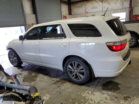 2013 Dodge Durango R/T with VIN 1C4SDJCT7DC675499, listed as a Copart auction lot 88967505 with 122,642 mi miles and Salvage title. Bid and sale history available at DreamBid. Image 2.