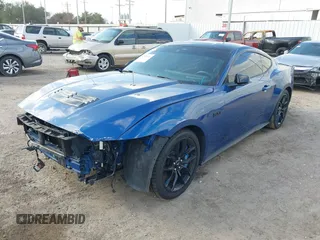 2024 Ford Mustang GT with VIN 1FA6P8CF1R5410493, listed as a IAAI auction lot 41394670 with 21,985 mi miles and . Bid and sale history available at DreamBid. Image 2.