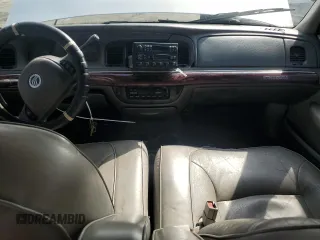 2001 Mercury Grand Marquis LS z VIN 2MEFM75W31X704781, wystawiony jako Copart lot #54613735 z przebiegiem 191 323 mil mil oraz Szkody całkowita. Historia ofert i sprzedaży dostępna na DreamBid. Obrazek 8.