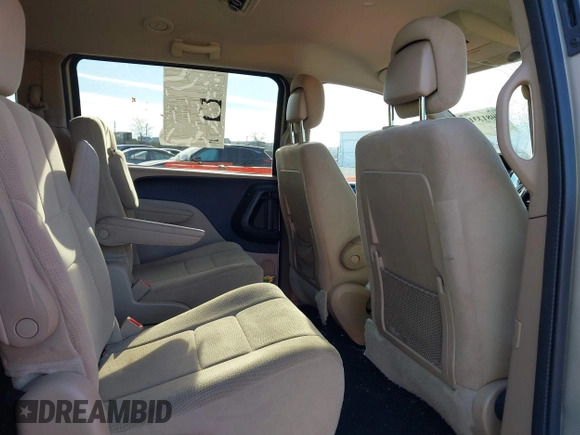 2014 Dodge Grand Caravan SXT with VIN 2C4RDGCG0ER210186, listed as a IAAI auction lot 40813319 with 100,230 mi miles and . Bid and sale history available at DreamBid. Image 8.
