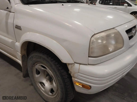 2000 Suzuki Grand Vitara JLX with VIN JS3TD62VXY4130242, listed as a IAAI auction lot 41701849 with 106,700 mi miles. Bid and sale history available at carsss.com. Image 6.
