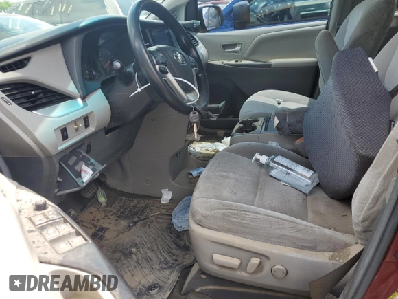 2015 Toyota Sienna LE AAS with VIN 5TDKK3DC9FS571386, listed as a Copart auction lot 52040875 with Not Provided miles and Salvage Title. Bid and sale history available at DreamBid. Image 7.