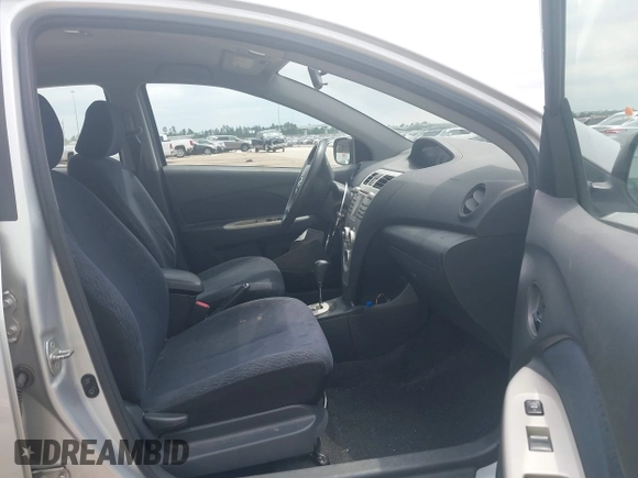 2008 Toyota Yaris with VIN JTDBT923184018720, listed as a IAAI auction lot 42038762 with 246,994 mi miles. Bid and sale history available at carsss.com. Image 5.