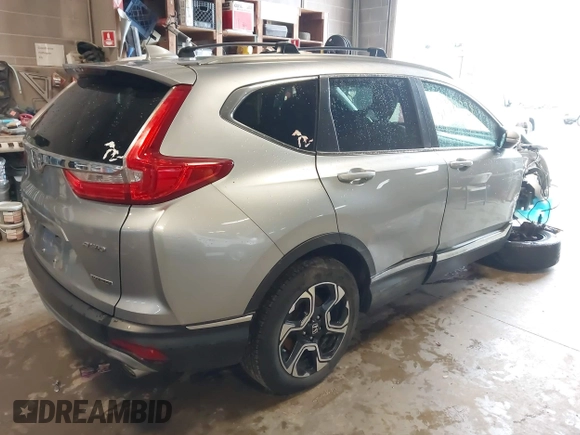 2017 Honda CR-V Touring with VIN 5J6RW2H95HL042012, listed as a IAAI auction lot 41911028 with 93,575 mi miles. Bid and sale history available at carsss.com. Image 4.