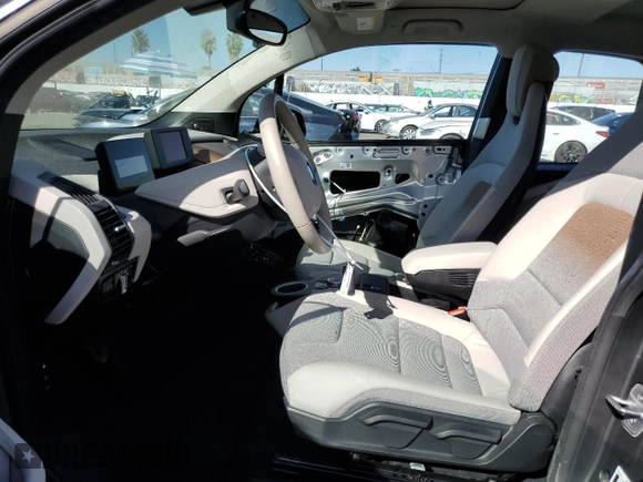 2019 BMW i3 with VIN WBY8P4C51K7E84270, listed as a Copart auction lot 77707224 with 15,584 mi miles and Salvage Title. Bid and sale history available at carsss.com. Image 7.