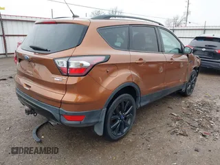 2017 Ford Escape Titanium with VIN 1FMCU9J99HUB75687, listed as a IAAI auction lot 41180789 with 108,967 mi miles. Bid and sale history available at carsss.com. Image 4.