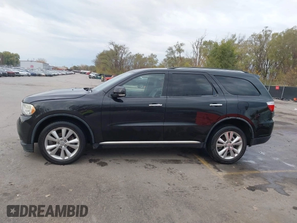 2013 Dodge Durango Crew with VIN 1C4RDHDG8DC592706, listed as a IAAI auction lot 40745114 with 95,757 mi miles and . Bid and sale history available at DreamBid. Image 14.