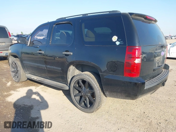 2007 Chevrolet Tahoe LS with VIN 1GNFC13CX7R406202, listed as a IAAI auction lot 41951878 with 181,571 mi miles and . Bid and sale history available at DreamBid. Image 3.