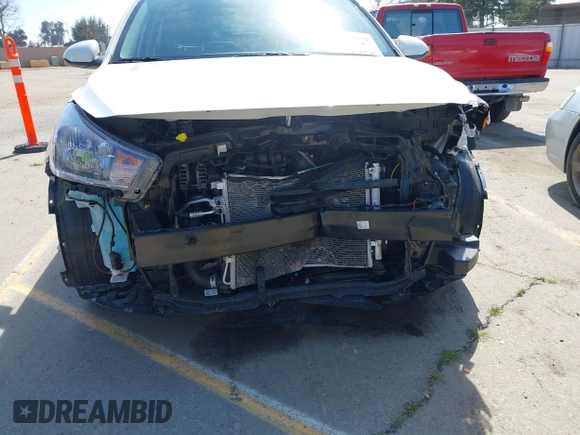 2023 Kia Rio S with VIN 3KPA25AD0PE629868, listed as a IAAI auction lot 41738952 with 25,642 mi miles and . Bid and sale history available at DreamBid. Image 22.
