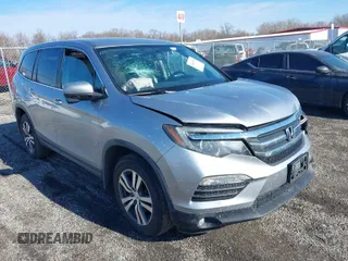 2016 Honda Pilot EX-L with VIN 5FNYF6H50GB092999, listed as a IAAI auction lot 41462504 with 141,604 mi miles. Bid and sale history available at carsss.com. Image 1.