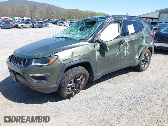 2018 Jeep Compass Trailhawk with VIN 3C4NJDDB0JT241163, listed as a IAAI auction lot 41986193 with 89,246 mi miles and . Bid and sale history available at DreamBid. Image 2.