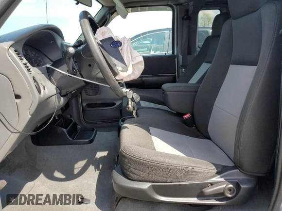 2009 Ford Ranger XLT with VIN 1FTZR45E89PA46348, listed as a Copart auction lot 54423735 with 96,057 mi miles and Salvage title. Bid and sale history available at DreamBid. Image 7.