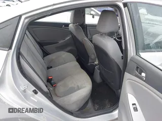 2015 Hyundai Accent GLS with VIN KMHCT4AE5FU883113, listed as a IAAI auction lot 41899701 with 123,023 mi miles and . Bid and sale history available at carsss.com. Image 8.
