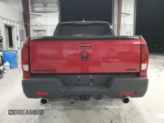 2021 Honda Ridgeline Sport with VIN 5FPYK3F10MB021380, listed as a Copart auction lot 48870685 with 52,317 mi miles and Salvage title. Bid and sale history available at DreamBid. Image 6.