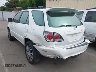 2002 Lexus RX 300 with VIN JTJHF10U320286954, listed as a IAAI auction lot 42097056 with 283,926 mi miles. Bid and sale history available at carsss.com. Image 3.