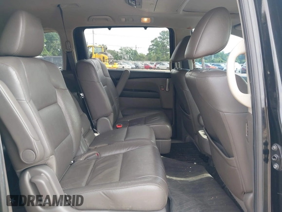 2011 Honda Odyssey Touring with VIN 5FNRL5H90BB070472, listed as a IAAI auction lot 42367710 with 203,589 mi miles and . Bid and sale history available at DreamBid. Image 8.