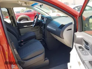2008 Dodge Grand Caravan SE with VIN 2D8HN44HX8R669889, listed as a IAAI auction lot 42061298 with 236,640 mi miles and . Bid and sale history available at DreamBid. Image 5.