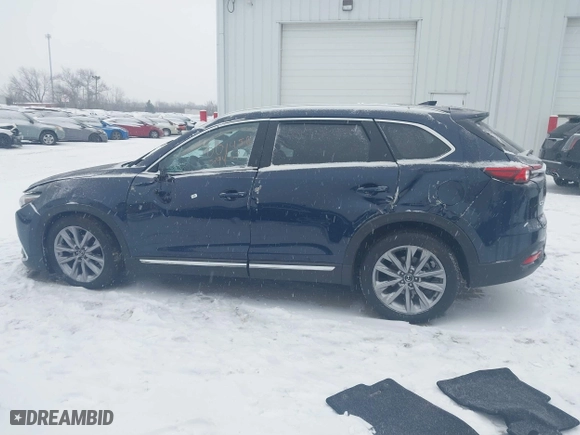 2021 Mazda CX-9 Grand Touring with VIN JM3TCBDY1M0519457, listed as a IAAI auction lot 41301146 with 22,087 mi miles. Bid and sale history available at carsss.com. Image 14.