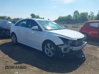 2014 Chevrolet Cruze 2LT z VIN 1G1PE5SB6E7122624, wystawiony jako IAAI lot #42278061 z przebiegiem 136 442 mil mil oraz . Historia ofert i sprzedaży dostępna na DreamBid. Obrazek 1.