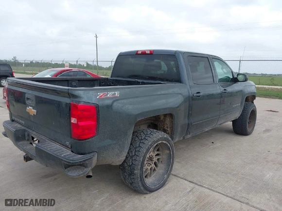 2017 Chevrolet Silverado 1500 LT with VIN 3GCUKREC1HG253015, listed as a IAAI auction lot 41951961 with 148,239 mi miles. Bid and sale history available at carsss.com. Image 4.