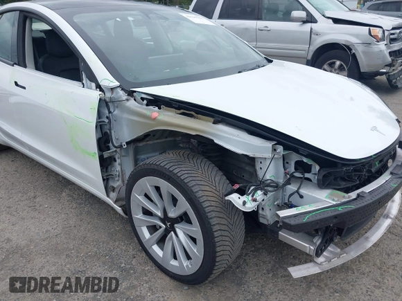 2023 Tesla Model 3 z VIN 5YJ3E1EA9PF431356, wystawiony jako IAAI lot #42620155 z przebiegiem 101 626 mil mil oraz . Historia ofert i sprzedaży dostępna na DreamBid. Obrazek 6.