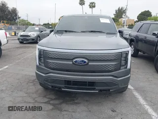 2023 Ford F-150 Lightning Pro with VIN 1FTVW1EL8PWG48559, listed as a IAAI auction lot 42033123 with 8,845 mi miles and . Bid and sale history available at DreamBid. Image 12.