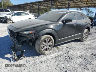 2020 Mazda CX-30 Premium with VIN 3MVDMAEM4LM137806, listed as a Copart auction lot 76620304 with 65,071 mi miles and Salvage title. Bid and sale history available at DreamBid. Image 1.