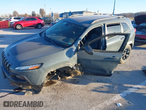 2015 Jeep Cherokee Trailhawk with VIN 1C4PJMBSXFW614416, listed as a IAAI auction lot 41033241 with 112,015 mi miles. Bid and sale history available at carsss.com. Image 18.