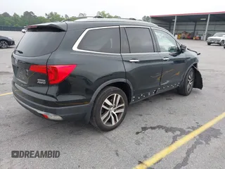 2017 Honda Pilot Touring with VIN 5FNYF6H93HB068846, listed as a IAAI auction lot 42083050 with 108,787 mi miles and . Bid and sale history available at DreamBid. Image 4.