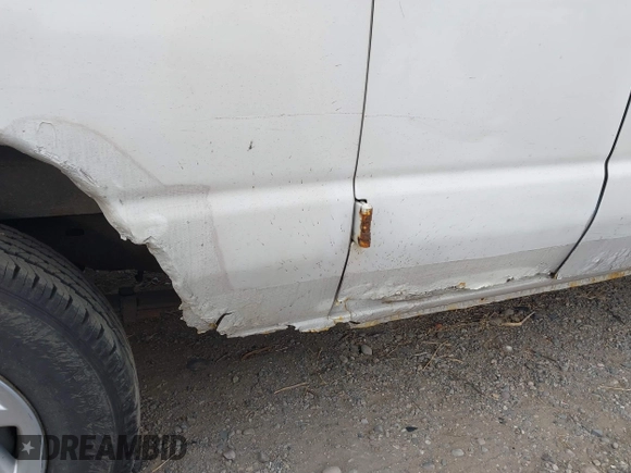 2009 Ford Econoline Cargo Commercial with VIN 1FTNE14W09DA91501, listed as a IAAI auction lot 41473298 with 99,129 mi miles and . Bid and sale history available at DreamBid. Image 6.