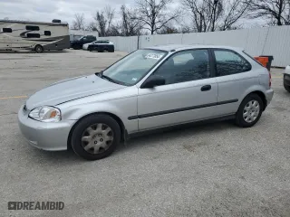 1999 Honda Civic DX with VIN 2HGEJ6446XH100761, listed as a Copart auction lot 84277854 with 82,619 mi miles and Clean Title. Bid and sale history available at carsss.com. Image 1.