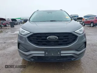 2023 Ford Edge SE z VIN 2FMPK4G95PBA41278, wystawiony jako IAAI lot #41964995 z przebiegiem 21 079 mil mil oraz . Historia ofert i sprzedaży dostępna na DreamBid. Obrazek 12.
