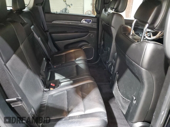 2018 Jeep Grand Cherokee Overland with VIN 1C4RJFCG1JC287784, listed as a Copart auction lot 50391255 with 105,981 mi miles and Salvage title. Bid and sale history available at DreamBid. Image 11.