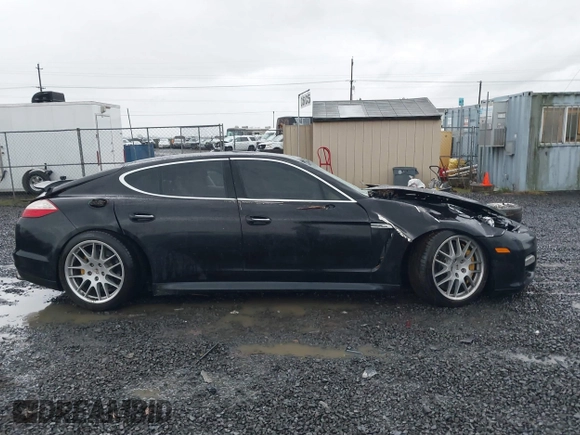 2010 Porsche Panamera Turbo z VIN WP0AC2A73AL090974, wystawiony jako IAAI lot #41105495 z przebiegiem 183 256 mil mil oraz . Historia ofert i sprzedaży dostępna na DreamBid. Obrazek 14.