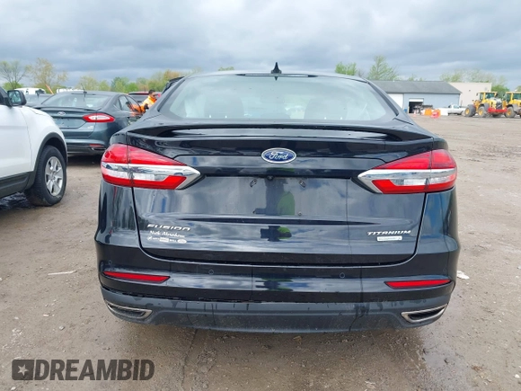 2019 Ford Fusion Titanium with VIN 3FA6P0K92KR248521, listed as a IAAI auction lot 42198307 with 51,844 mi miles and . Bid and sale history available at DreamBid. Image 16.