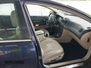 2002 Chrysler 300M M z VIN 2C3AE76K52H311224, wystawiony jako IAAI lot #42219634 z przebiegiem 172 884 mil mil oraz . Historia ofert i sprzedaży dostępna na DreamBid. Obrazek 5.
