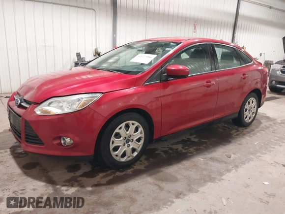 2012 Ford Focus SE z VIN 1FAHP3F21CL114445, wystawiony jako IAAI lot #42277986 z przebiegiem 89 317 mil mil oraz . Historia ofert i sprzedaży dostępna na DreamBid. Obrazek 2.