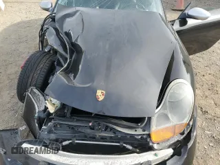 2000 Porsche Boxster z VIN WP0CA2984YU627674, wystawiony jako Copart lot #86027054 z przebiegiem 112 153 mil mil oraz Szkoda całkowita • Salvage title. Historia ofert i sprzedaży dostępna na DreamBid. Obrazek 13.