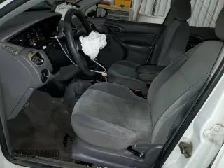 2002 Ford Focus LX with VIN 1FAFP33P52W126344, listed as a Copart auction lot 49757324 with 140,612 mi miles and Salvage Title. Bid and sale history available at DreamBid. Image 7.