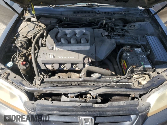 2001 Honda Accord EX с VIN 1HGCG22551A022831, выставлен на аукционе Copart как лот 52011585 с пробегом 248 025 миль миль и Списание • Salvage title. История ставок и продаж доступна на DreamBid. Изображение 13.