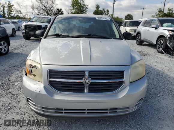 2009 Dodge Caliber SXT with VIN 1B3HB48AX9D157186, listed as a Copart auction lot 52892065 with 218,024 mi miles and Salvage Title. Bid and sale history available at carsss.com. Image 5.