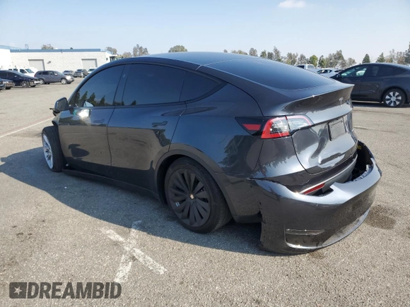 2024 Tesla Model Y Long Range with VIN 7SAYGAEE0RF018427, listed as a Copart auction lot 42455075 with 13,347 mi miles and Salvage Title. Bid and sale history available at DreamBid. Image 2.