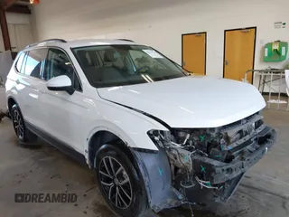 2021 Volkswagen Tiguan SE with VIN 3VV2B7AX2MM087329, listed as a IAAI auction lot 42510715 with 68,162 mi miles and . Bid and sale history available at DreamBid. Image 1.