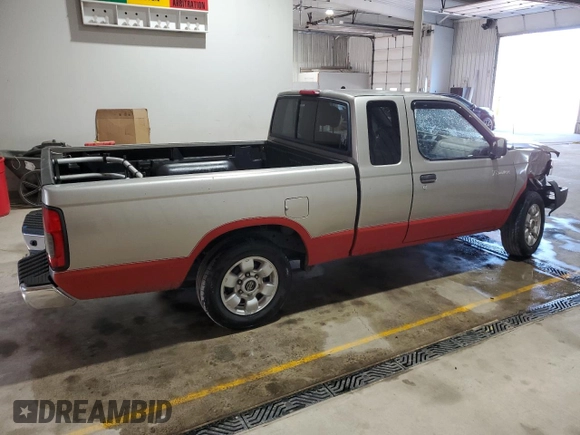 2000 Nissan Frontier XE with VIN 1N6DD26S8YC337811, listed as a Copart auction lot 54775915 with 129,427 mi miles and Salvage title. Bid and sale history available at DreamBid. Image 3.