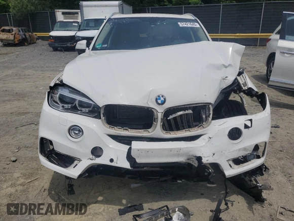 2015 BMW X5 xDrive35i z VIN 5UXKR0C53F0K61488, wystawiony jako Copart lot #57421645 z przebiegiem Nie podano mil oraz Szkoda całkowita • Salvage title. Historia ofert i sprzedaży dostępna na DreamBid. Obrazek 5.
